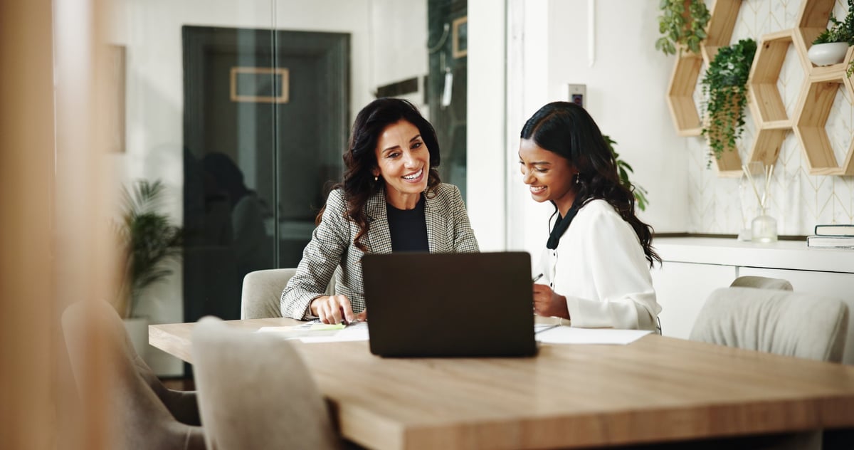 Business team reviewing financial reports together in an office meeting